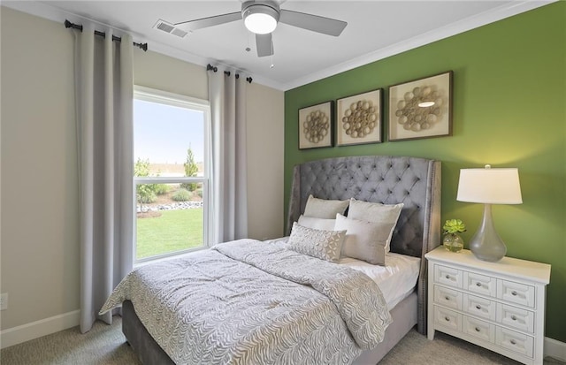 bedroom with visible vents, crown molding, ceiling fan, baseboards, and light carpet