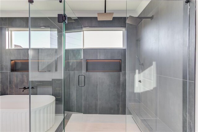 bathroom featuring an enclosed shower