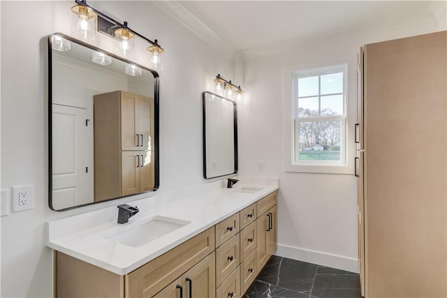 bathroom featuring crown molding and vanity