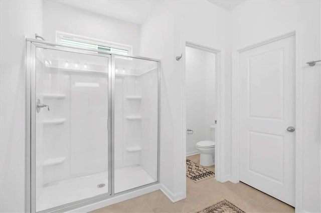 2703 Jordan Ln, Lithia Springs, GA 30122 - full bath featuring a stall shower and tile patterned floors