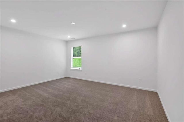 2703 Jordan Ln, Lithia Springs, GA 30122 - spare room with carpet and recessed lighting
