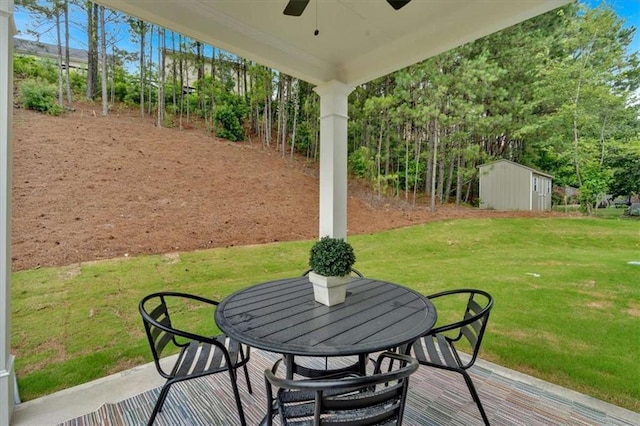 2703 Jordan Ln, Lithia Springs, GA 30122 - view of patio / terrace featuring ceiling fan and a storage shed