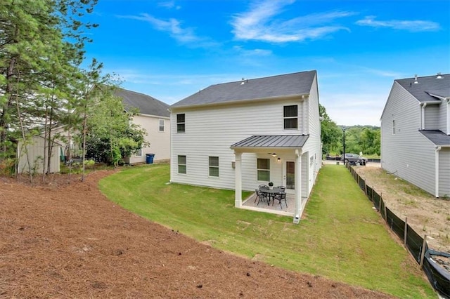 2703 Jordan Ln, Lithia Springs, GA 30122 - back of house with a patio area