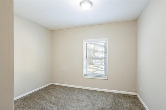 view of carpeted spare room