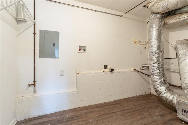 washroom with wood-type flooring, electric dryer hookup, electric panel, and washer hookup