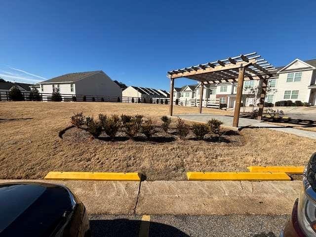 view of yard with a pergola