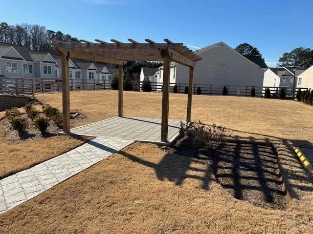 exterior space featuring a pergola