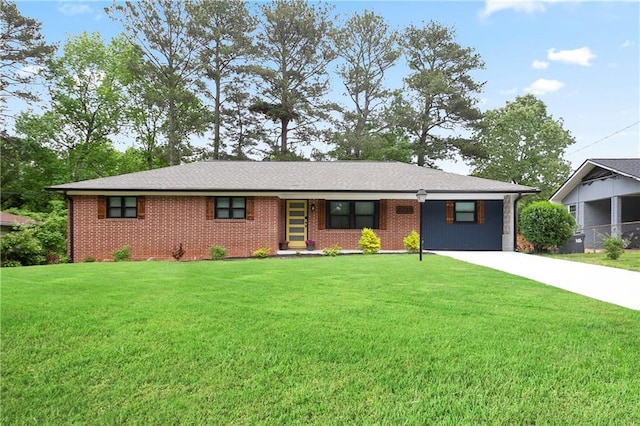 ranch-style house with brick siding, a front lawn, and concrete driveway