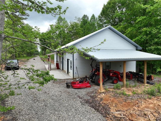 view of home's exterior featuring metal roof