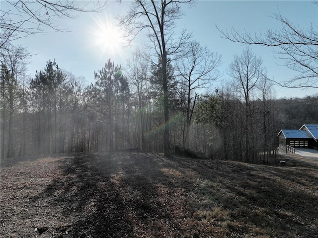 view of landscape with a view of trees