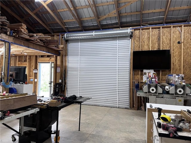 garage with a workshop area