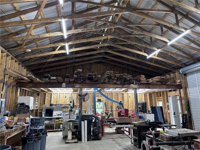 misc room featuring a workshop area and lofted ceiling