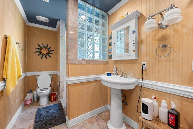 6048 Kings Mountain Way, Tucker, GA 30087 - bathroom with crown molding, toilet, and wooden walls