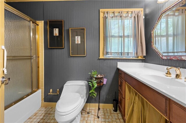 6048 Kings Mountain Way, Tucker, GA 30087 - full bath with toilet, enclosed tub / shower combo, vanity, and baseboards