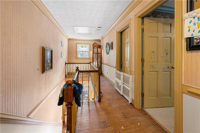 6048 Kings Mountain Way, Tucker, GA 30087 - hall featuring an upstairs landing, hardwood / wood-style flooring, ornamental molding, and a textured ceiling