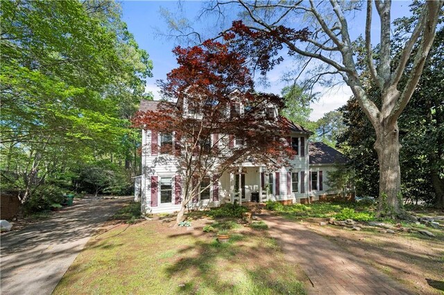 6048 Kings Mountain Way, Tucker, GA 30087 - view of front of property featuring driveway and covered porch