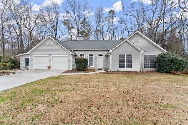 ranch-style house with a garage, a front yard, driveway, and a chimney