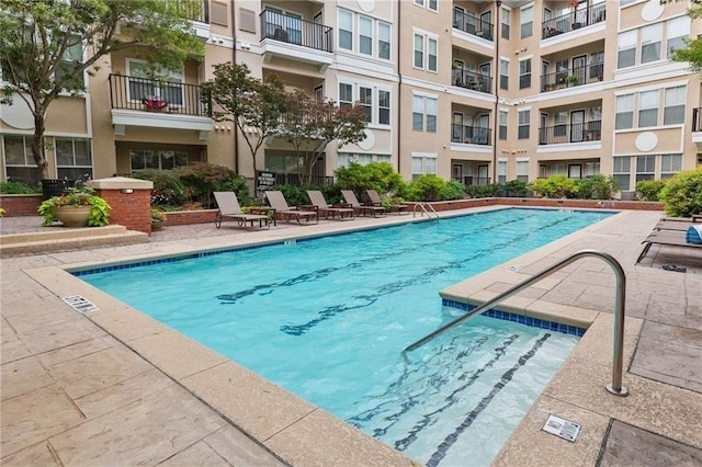 view of pool with a patio area