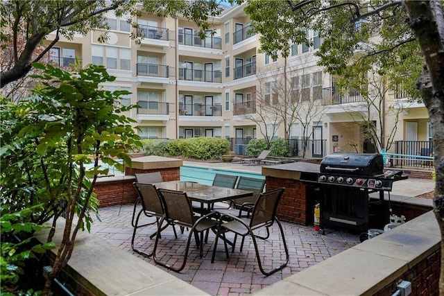 view of patio / terrace featuring a grill