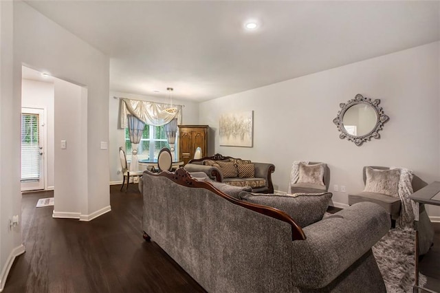 living room featuring dark hardwood / wood-style flooring