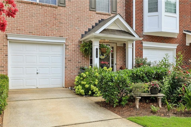 doorway to property featuring a garage