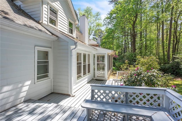 wooden deck with outdoor dining area