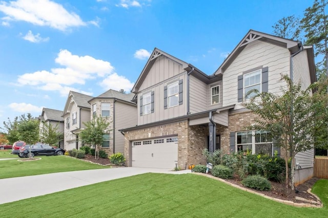 view of front of home featuring a front yard and a garage