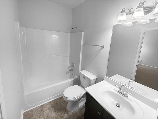 full bathroom with  shower combination, vanity, and toilet