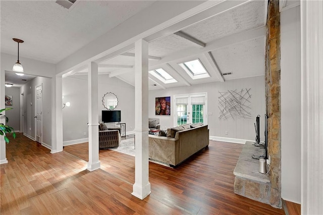 1328 Hidden Hills Pkwy, Stone Mountain, GA 30088 - living area featuring wood finished floors and a skylight