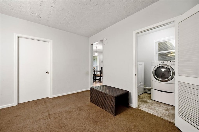 1328 Hidden Hills Pkwy, Stone Mountain, GA 30088 - laundry area with washer / dryer, carpet, and a textured ceiling