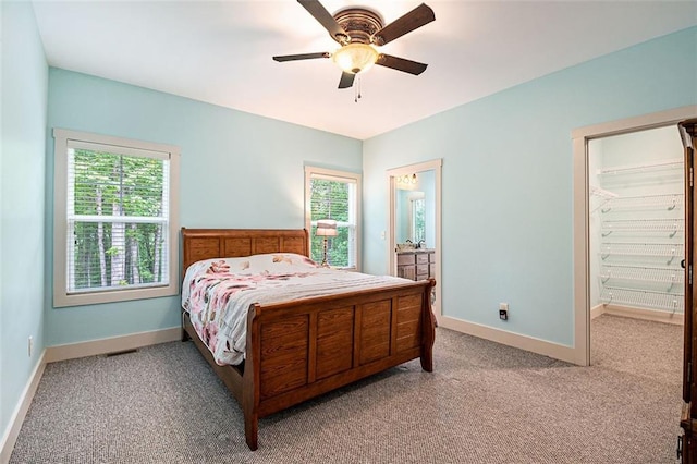 562 Yonah Lake Dr, Sautee Nacoochee, GA 30572 - bedroom featuring light carpet, baseboards, and ceiling fan
