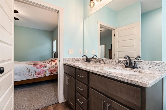 562 Yonah Lake Dr, Sautee Nacoochee, GA 30572 - ensuite bathroom with double vanity and wood finished floors