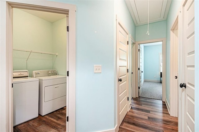 562 Yonah Lake Dr, Sautee Nacoochee, GA 30572 - washroom featuring attic access, dark wood-type flooring, washer and dryer, and baseboards