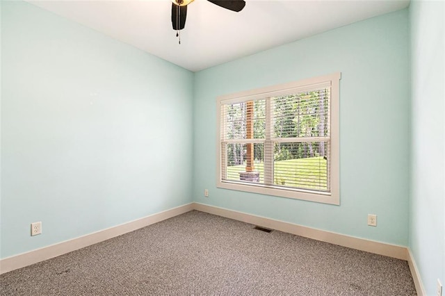 562 Yonah Lake Dr, Sautee Nacoochee, GA 30572 - spare room with light carpet, baseboards, and a ceiling fan