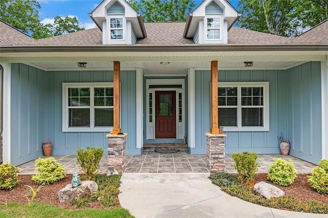 562 Yonah Lake Dr, Sautee Nacoochee, GA 30572 - doorway to property featuring roof with shingles, board and batten siding, and covered porch