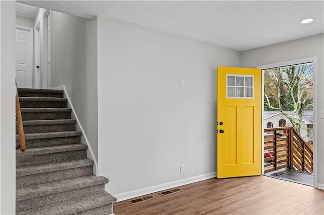 foyer entrance featuring hardwood / wood-style flooring