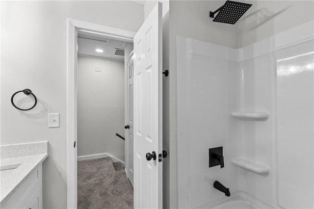 bathroom featuring vanity and tub / shower combination