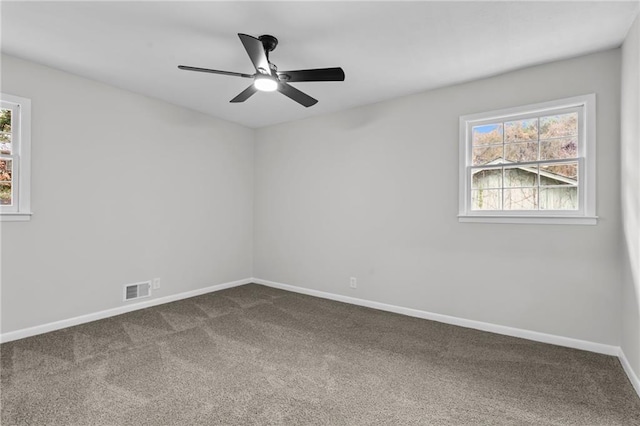 unfurnished room featuring carpet floors and ceiling fan