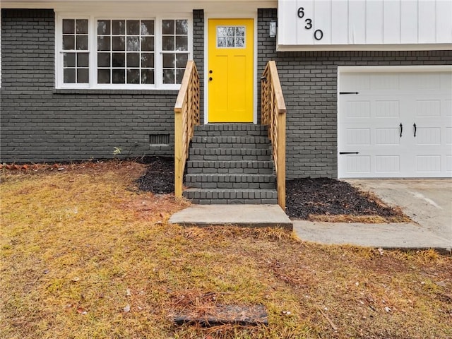 entrance to property with a garage