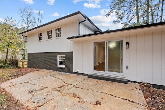 back of property featuring a patio area