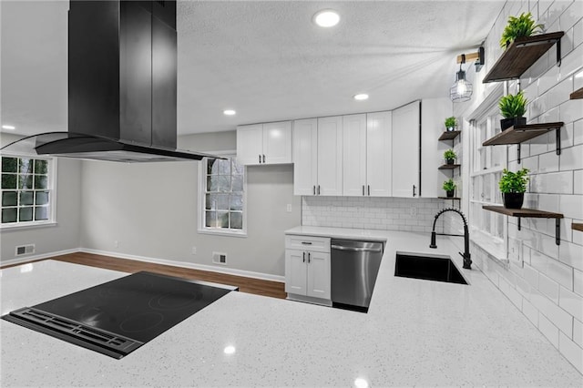 kitchen featuring sink, white cabinetry, light stone counters, dishwasher, and island exhaust hood