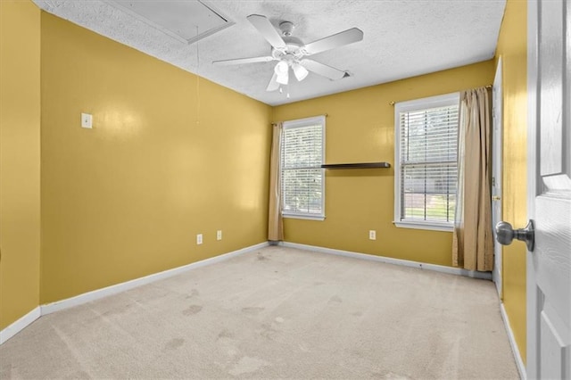 305 Hickory Pointe Ct, Villa Rica, GA 30180 - empty room featuring attic access, carpet flooring, a textured ceiling, and ceiling fan