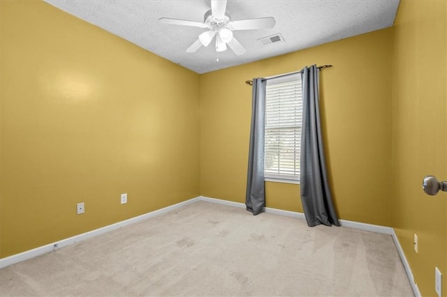 305 Hickory Pointe Ct, Villa Rica, GA 30180 - spare room featuring a ceiling fan, a textured ceiling, and carpet floors
