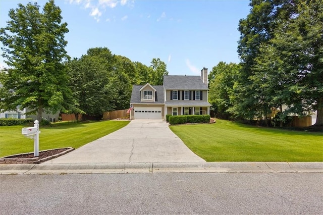 305 Hickory Pointe Ct, Villa Rica, GA 30180 - colonial-style house featuring driveway, a chimney, and a garage