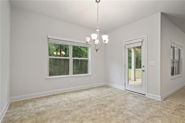 61 Castlemoor Loop, Adairsville, GA 30103 - unfurnished room with a chandelier, plenty of natural light, and baseboards