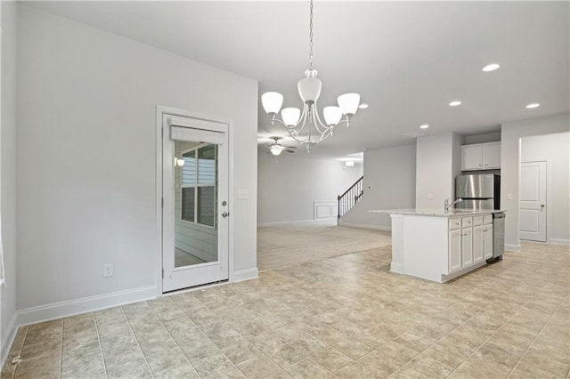 61 Castlemoor Loop, Adairsville, GA 30103 - kitchen with recessed lighting, white cabinets, appliances with stainless steel finishes, and an inviting chandelier