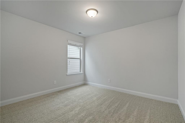 61 Castlemoor Loop, Adairsville, GA 30103 - spare room featuring baseboards, visible vents, and light colored carpet