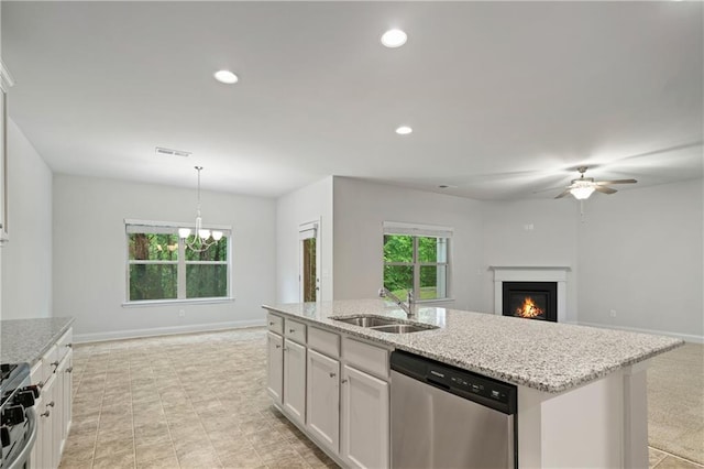 61 Castlemoor Loop, Adairsville, GA 30103 - kitchen with visible vents, a sink, a lit fireplace, appliances with stainless steel finishes, and ceiling fan with notable chandelier
