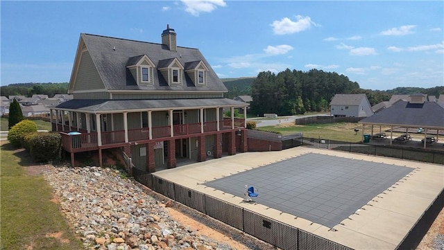 61 Castlemoor Loop, Adairsville, GA 30103 - rear view of house featuring a chimney and fence