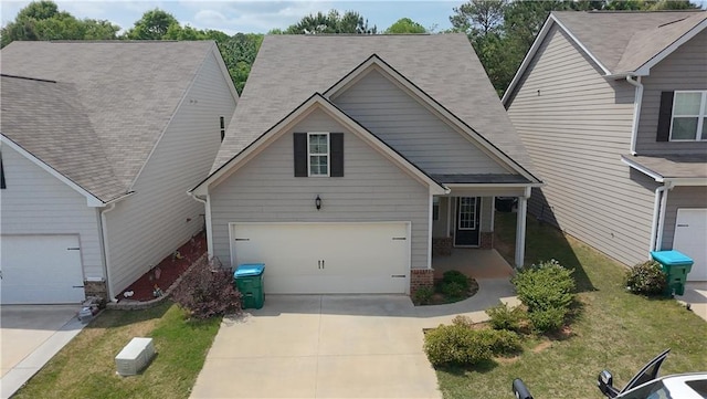 61 Castlemoor Loop, Adairsville, GA 30103 - traditional-style home featuring brick siding, a front lawn, and driveway